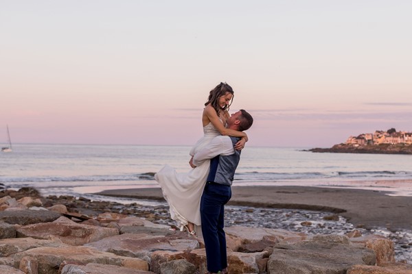 Romantic newlyweds on Short Sands Beach, Maine